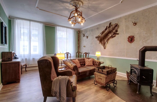Vacation apartment Herrenzimmer with fireplace and terrace