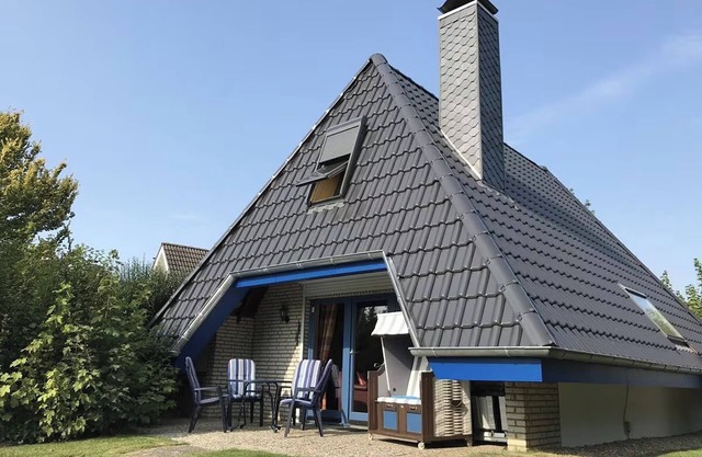 Vacation home "Opi Huck 26" - Comfortable North Sea enjoyment with fireplace and terrace