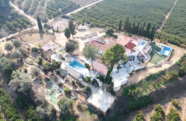 Vies and cool summer breeze over the plot and pool.