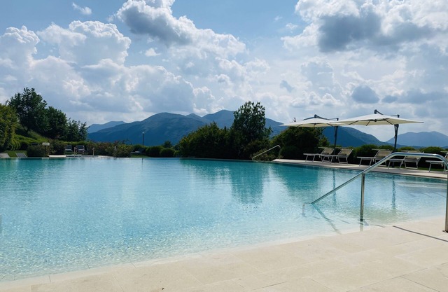 View apartment in the five-star Resort Collina d'Oro with access to the SPA.