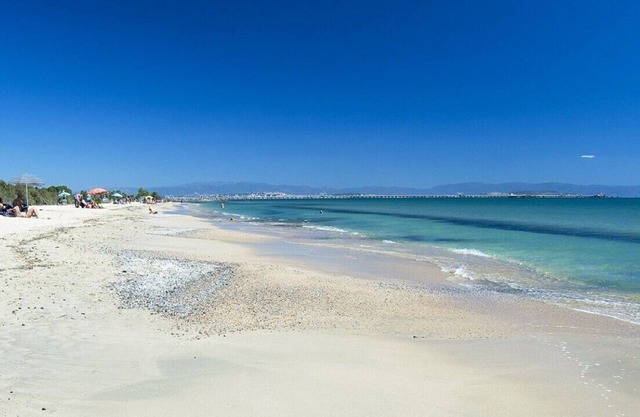 Villa 2 steps from the sea with private green garden, 5 beds and 2 bathrooms