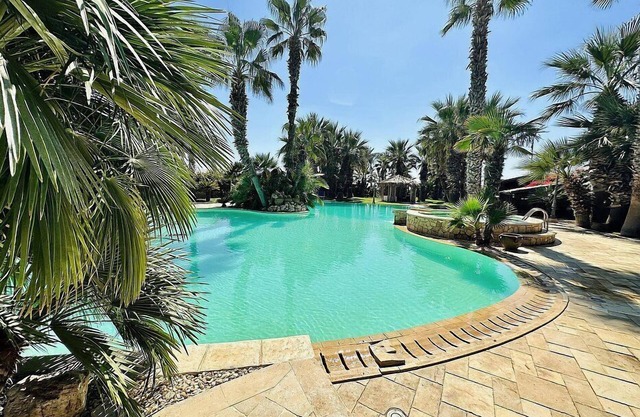 Villa Adelaide: A welcoming two-story villa situated at a few steps from a sandy beach, with Free WI-FI.