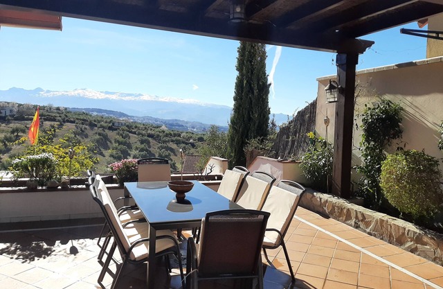 Villa Alfaguara is a rural house with views of the Sierra Nevada for 14 people