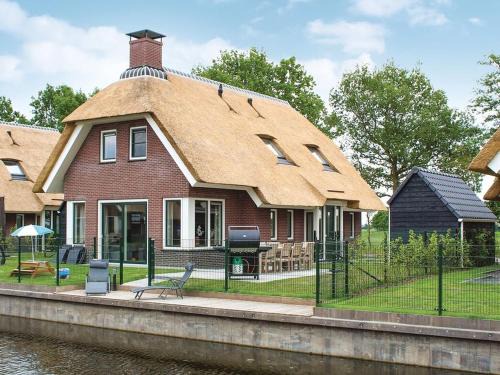 Villa in Friesland with Waterfront Jetty