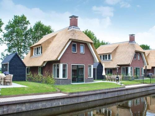Villa in Friesland with Sauna by Water