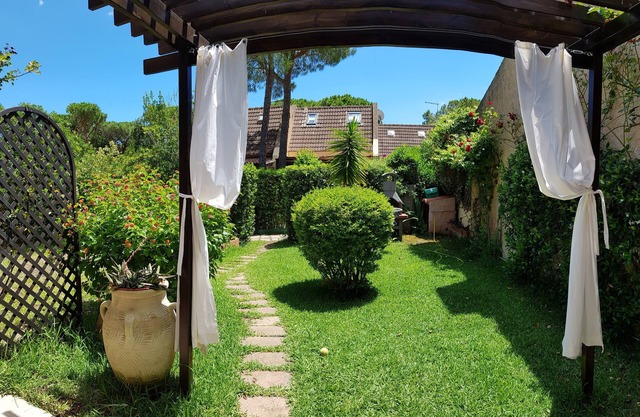 Villa with garden surrounded by greenery a stone's throw from the sea