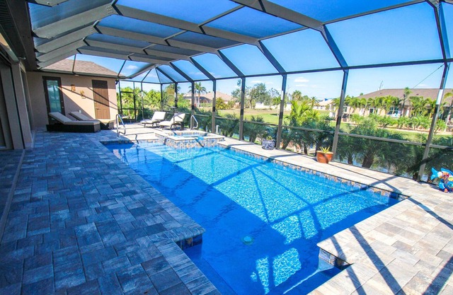 Villa Maricela: Exquisite 3 BR Private Pool/Spa Home On A Canal