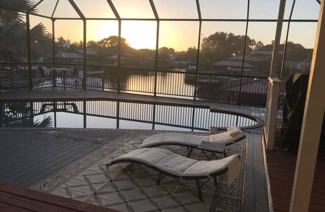 Villa Oasis, w/Heated & Covered Pool, Pool Table, Boat Dock, Gym and much more.