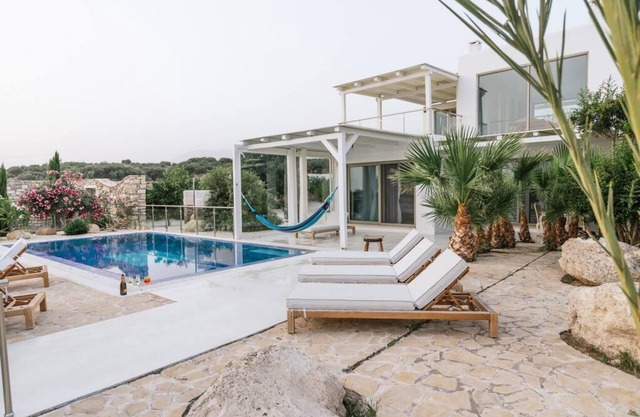 Villa Olympia in the palm trees.
