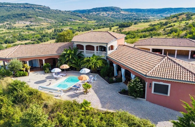Villa with a pool and spa offering a spectacular view.