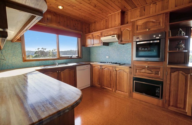 Wake up to panoramic views of the lake from the comfort of your cozy retreat