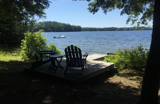 Walk out beach in private cove on Cobboossee Lake