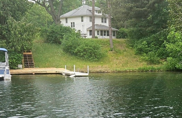 Warm and relaxing 100 year old waterfront house with dock is waiting for you!