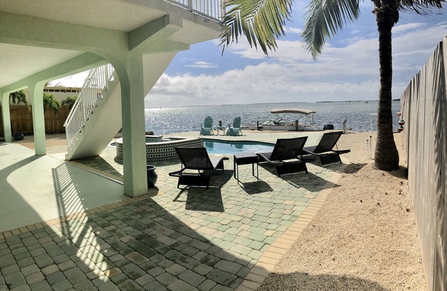 Water Front Home. Direct deep water access with private pool/spa/dock & Elevator