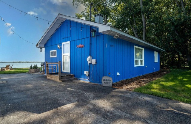 Waterfront 2BR Nautical Cottage on Grass Lake - Hot Tub, Firepit & Year-Round Fun