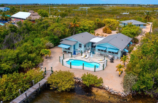 Waterfront Beach Houses with Dock & Heated Pool!