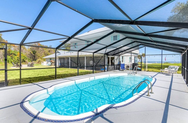 Waterfront Beauty: Sleeps 15, Heated Pool, Private Dock, Near Beach