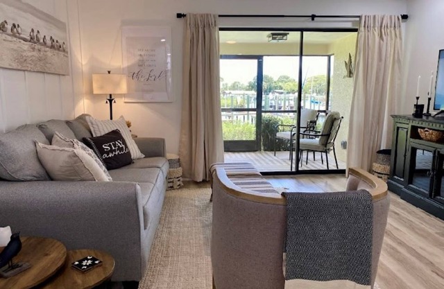 Waterfront condo, gated, dock, lanai, newly remodeled, single story, 2 bd/2 ba.
