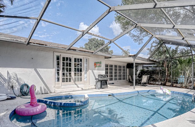 Waterfront escape with a private pool, dock, fast WiFi, & A/C - Dogs allowed