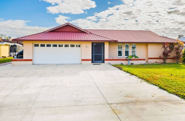 Waterfront home on a canal with saltwater pool, great patio, views & AC