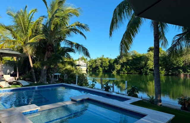 WATERFRONT Home on Deep Canal with private Pool, Spa and Dockage