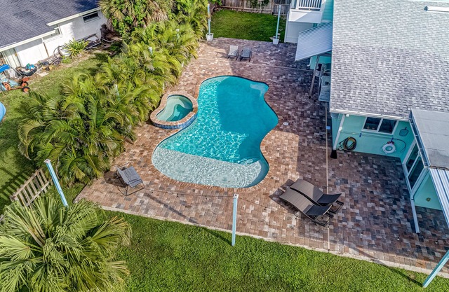 Waterfront home with saltwater pool, private dock, central AC & washer/dryer