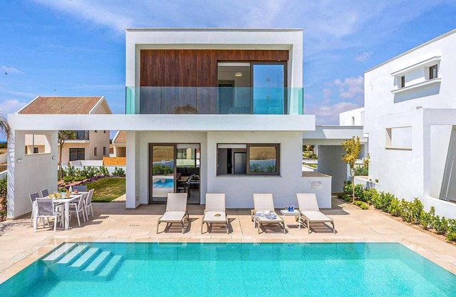 Welcome to this stunning, modern villa, which sits within an exclusive gated complex surrounded by f