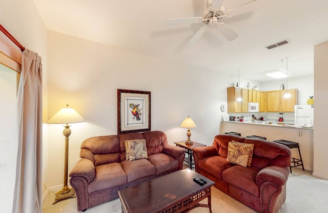 Welcoming ground-floor condo with patio, pool, fitness center, sauna, & hot tub