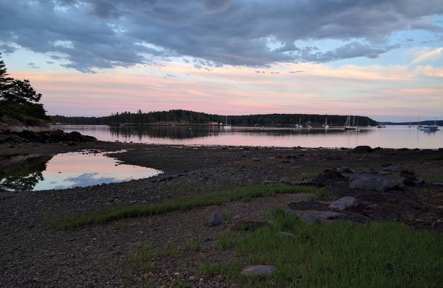 Welcoming vacation home offers a private setting on the water's edge