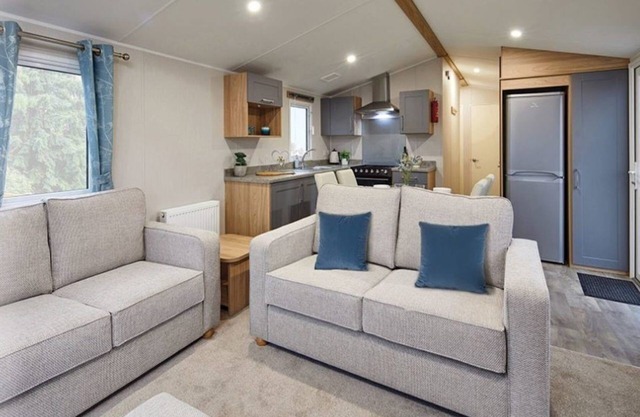Well appointed caravan with patio doors and decking.