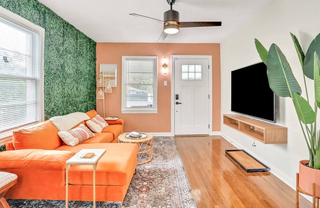 Whimsical Midtown home with covered porch, tennis & W/D - dog-friendly