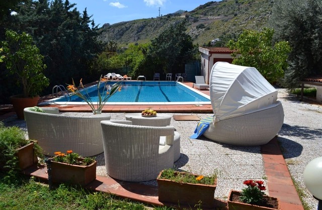 wonderful villa with private swimming pool, garden flowers and citrus