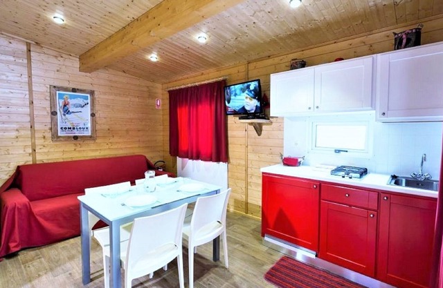Wooden chalet in La Salle with shared pool