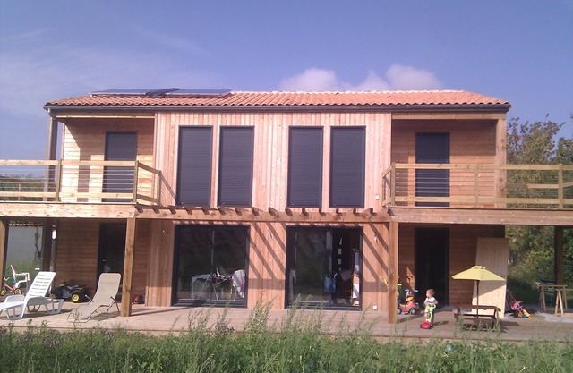 Wooden house, nature, 5 min. from the beach and golf course of St Laurent