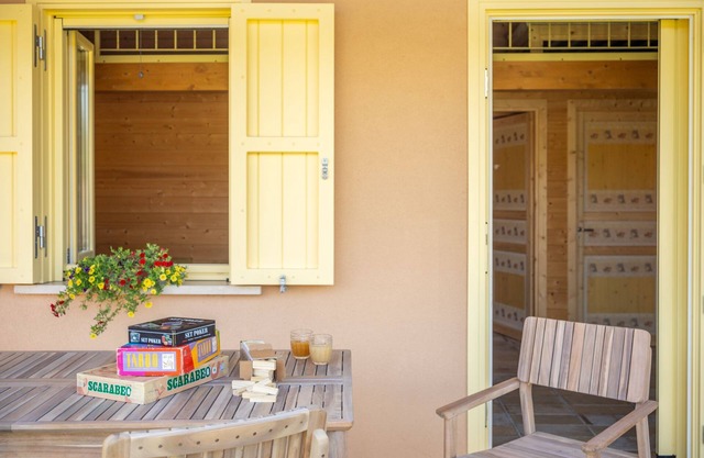Wooden house with porch and garden
