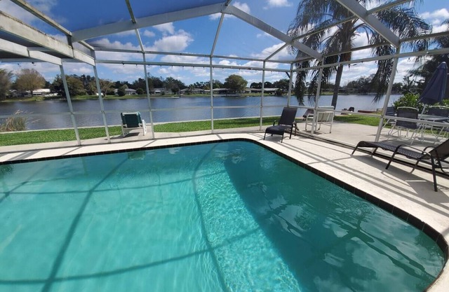 WOW Waterfront Heated Pool Home by BEACH Sleeps 12