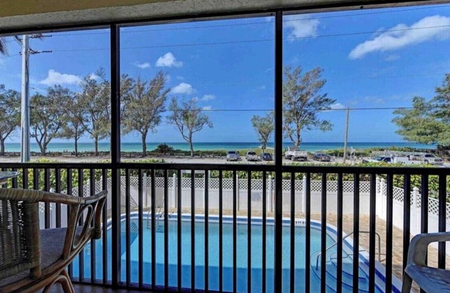Your Island getaway with amazing views and sunsets, just steps to the Beach!