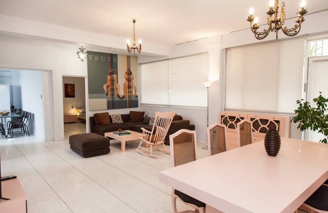 Ypsilon IconicAthensHome next to Mount Hymettus National Park