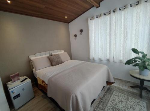Petropolis Apartment | Ótima suíte próxima ao centro