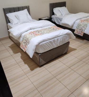 Ar Rayis Apartment | شقة مريحة وهادئه غرفتين وصالة شخصين مع أطفال الرايس