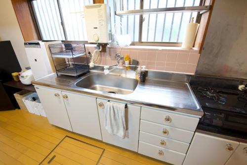 Hidaka Apartment | 日高貸家