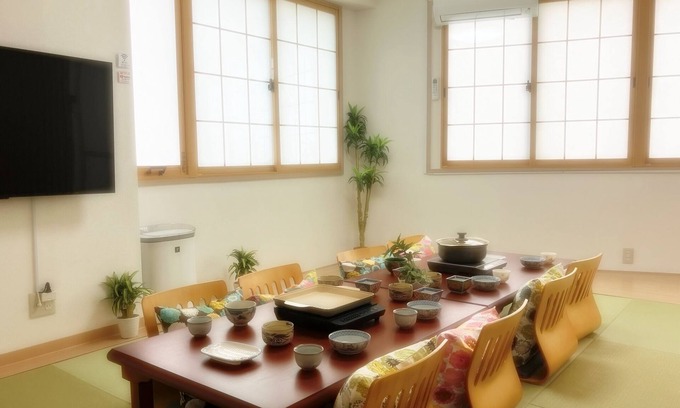 Nishi Apartment | 1 minute walk from the station in a good location! Accommodates 10 people! Rooftop BBQ available! Renovated! 3 bedrooms! 7 minutes to USJ! It takes 10 minutes to Namba by train! WIFI available
