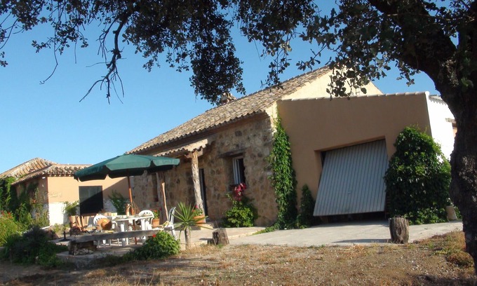 Almodovar del Rio House | 15 minutes from Cordoba stone house in meadow of 120 Ha with small castle