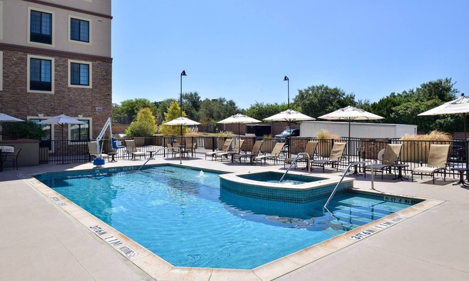 Hollywood Park Apartment | 15 Minutes from Six Flags! | Studio with Roll-in Shower + Outdoor Pool and Hot Tub