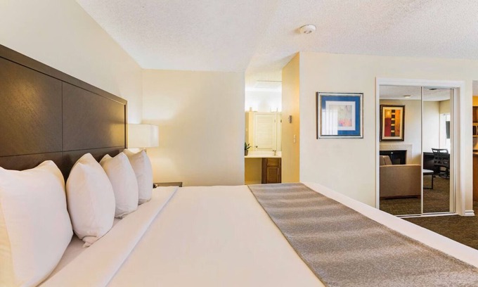 Biggs Field Hotel | 2 Spacious Suites – Pool, Free Breakfast & Full Kitchen