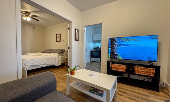 North End House | 2025 Renovated, bright/spacious main floor unit. Private driveway and backyard.
