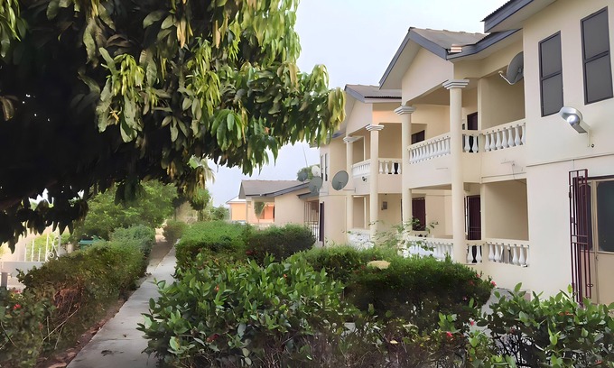 Winneba House | 25 minutes to Winneba Beach! A quiet family suite with dining and living area.