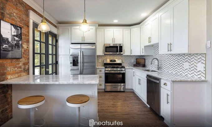 Covington Condo | 2BR Townhome w/Parking – Walk to Stadiums & DT