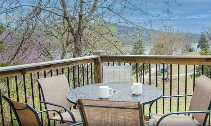 Indian Point Condo | 2BR Waterfront Duplex Cabin w/Pool + Swim & Boat dock