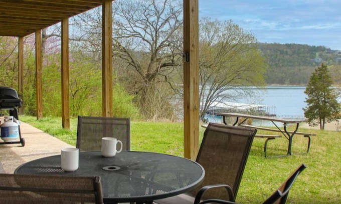 Indian Point Condo | 2BR Waterfront Duplex Cabin w/Pool + Swim & Boat dock